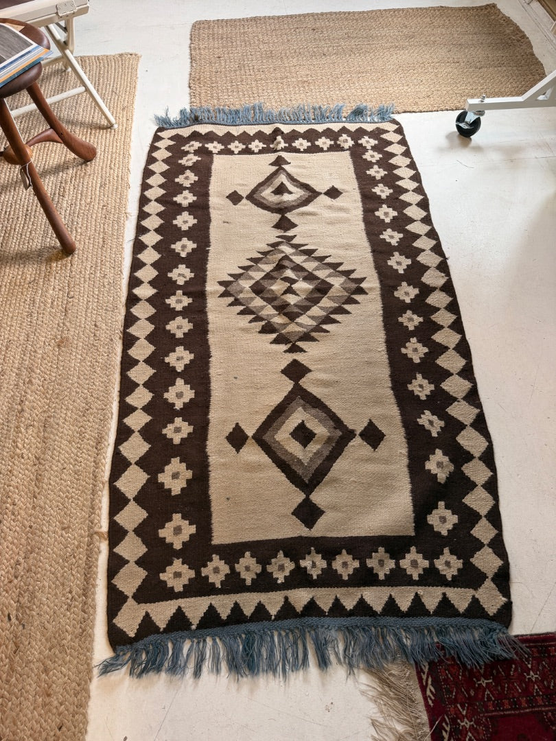 Wool sun fade swestern rug