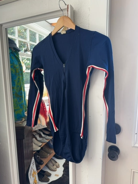 Blue unitard, red stripe