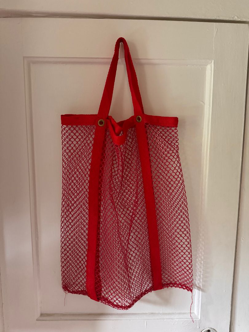 Red fishnet rectangular bag