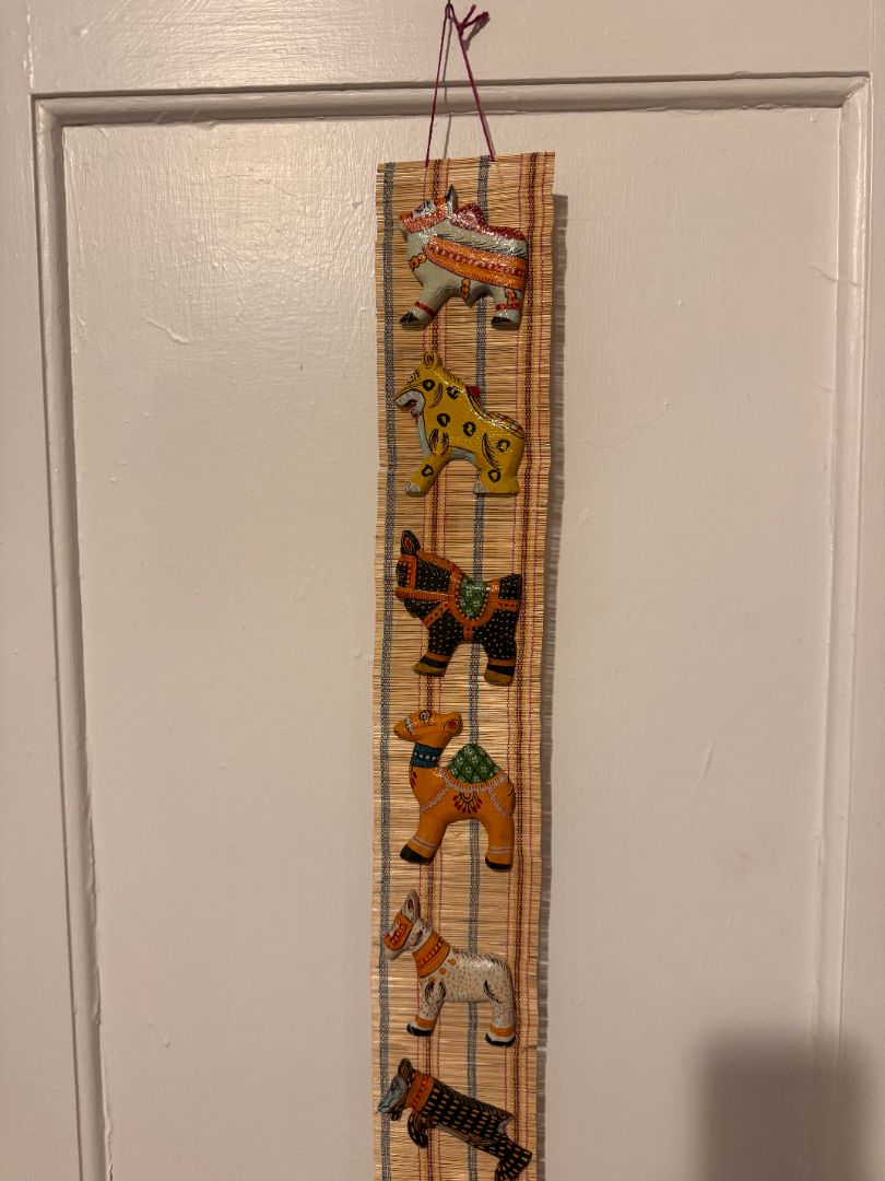 Folk painted animals wall hanging