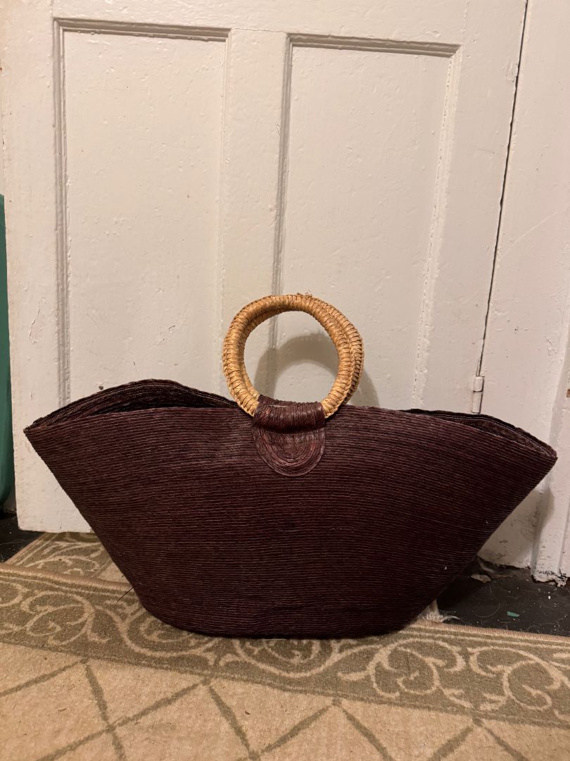 Woven brown bag, circular handles