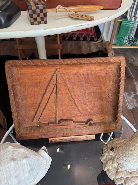 Wood carved sailboat