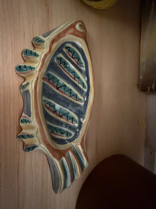 Multi colored art pottery fish