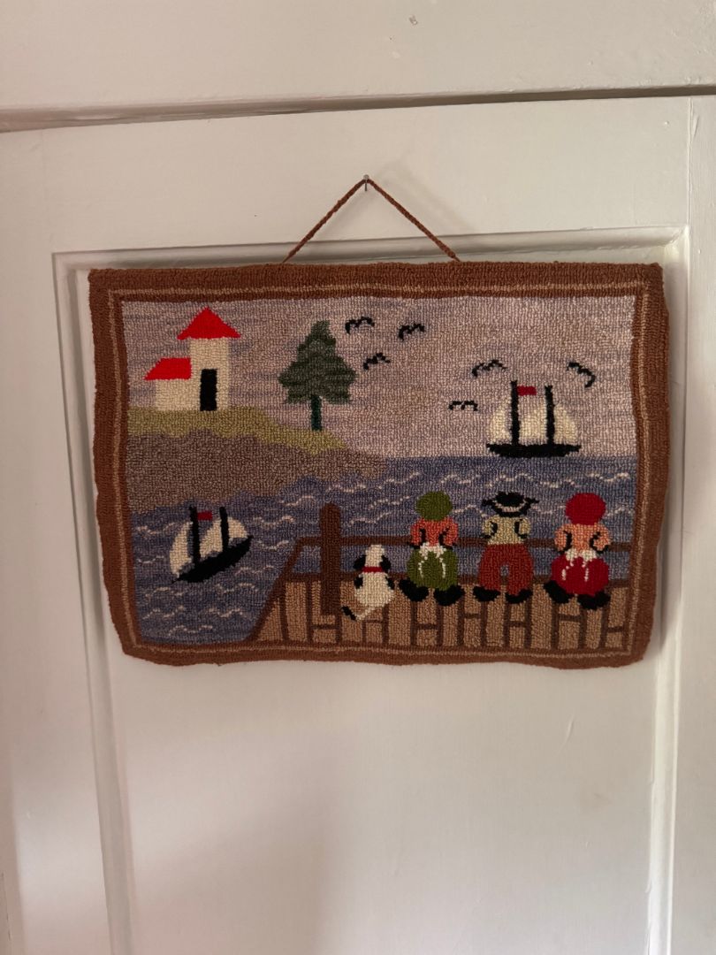 Seaside view rug hanging