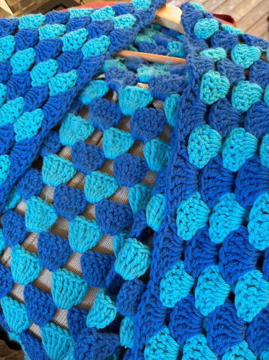 Blue tone crochet shawl