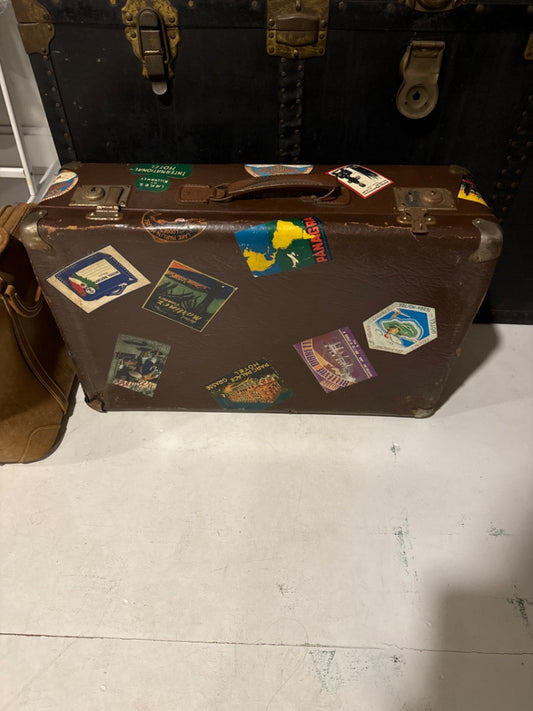 Suitcase w/travel stickers